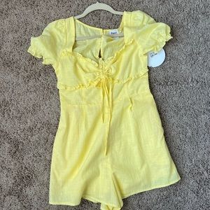 Princess Polly yellow romper, never worn, size 4